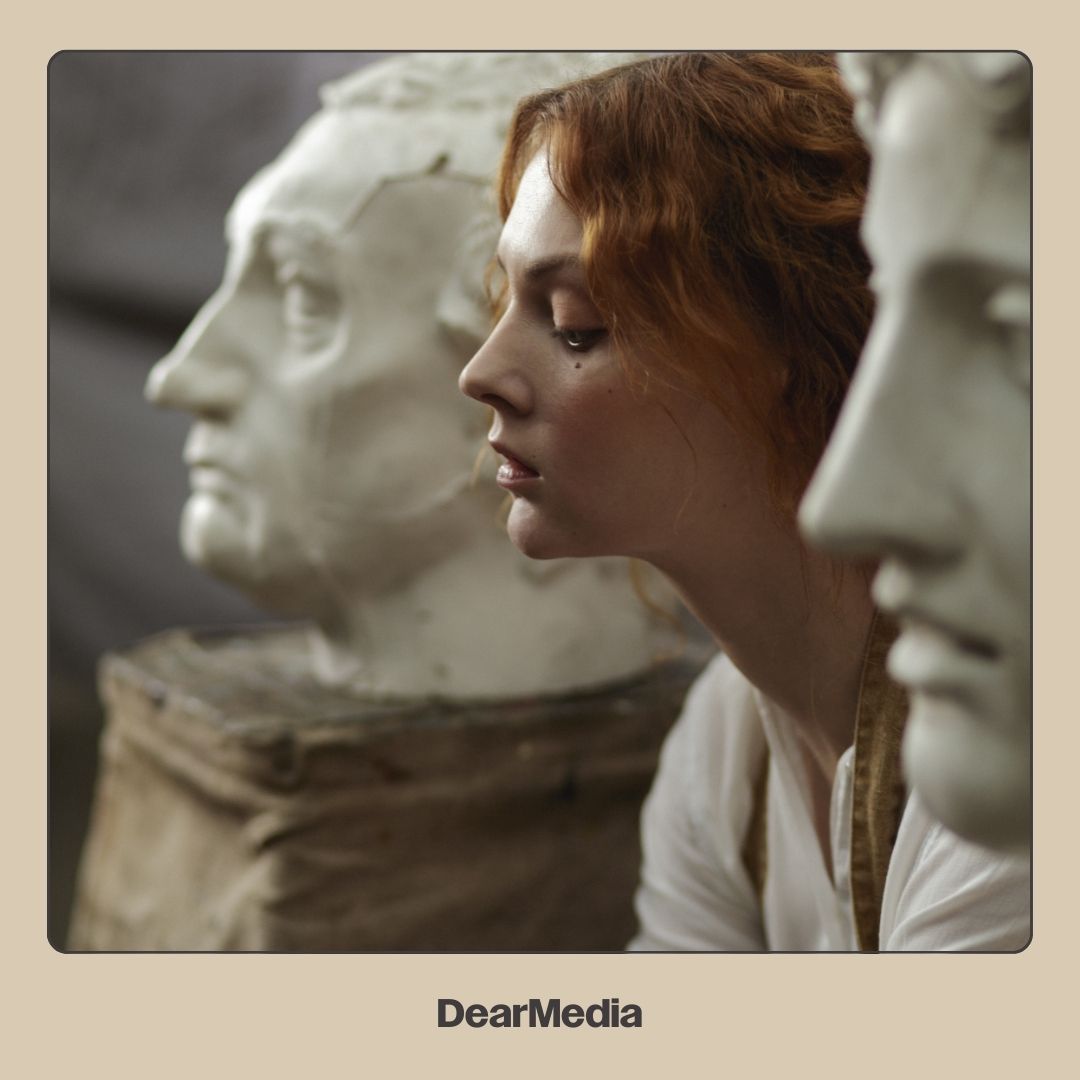 a woman in the middle of the statue