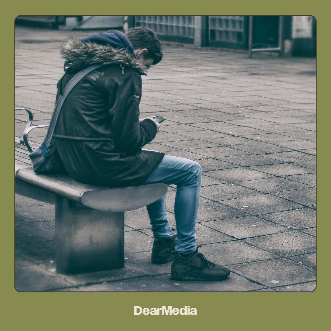 sad man on his phone